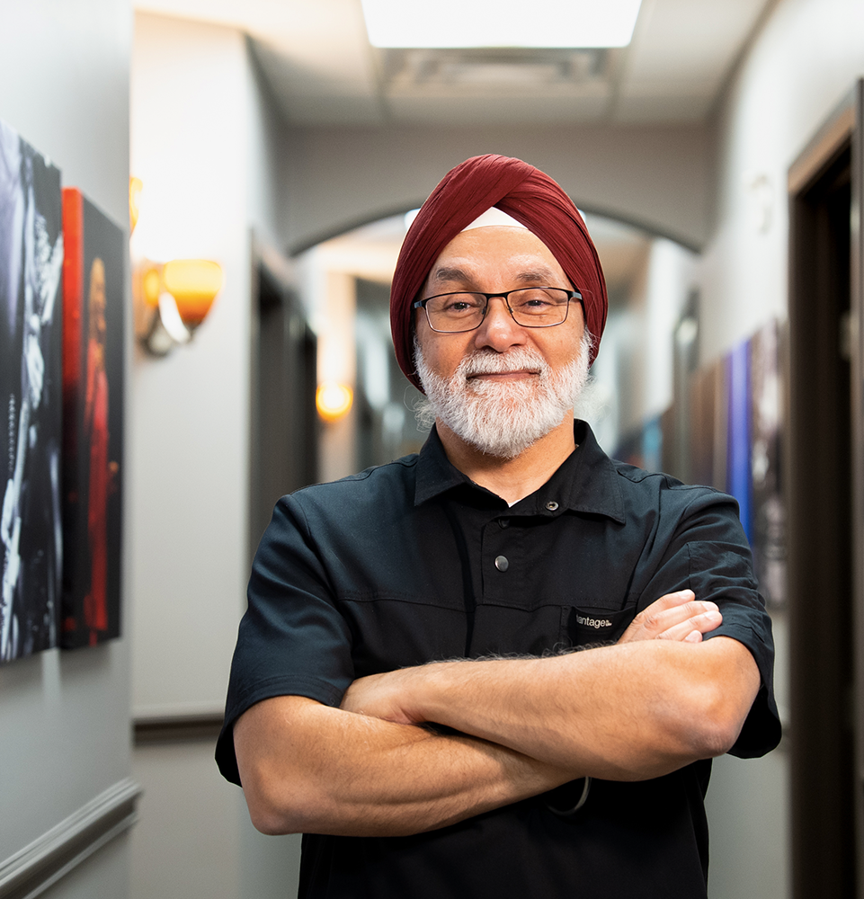 Dr. Bath standing in the hallway of his practice.